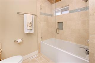 2395 Delaware, Unit 167 Santa Cruz, CA 95060 - Photo 21 of 33 a white bath tub sitting next to a white toilet