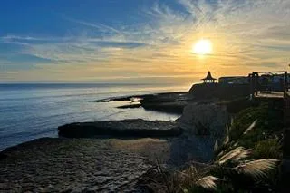 a view of an ocean and beach