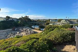 a view of a lake with houses