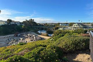 2395 Delaware, Unit 167 Santa Cruz, CA 95060 - Photo 27 of 33 a view of a lake with houses