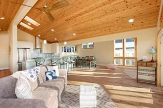 a living room with furniture and a table