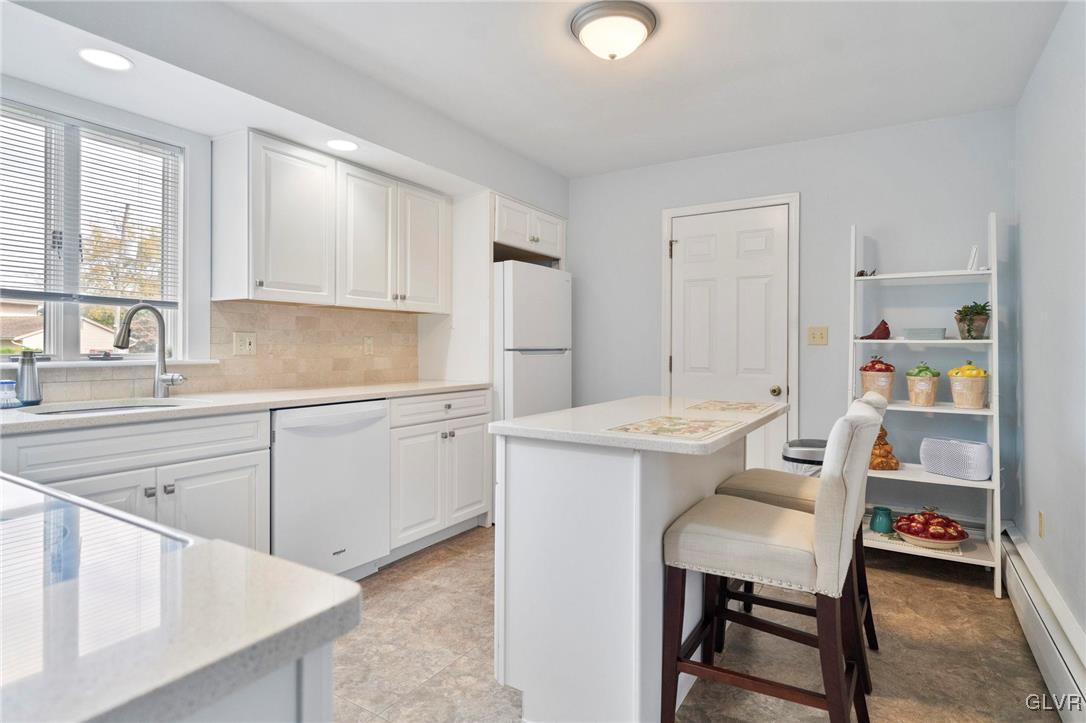 3920 Hemlock Place Bethlehem, PA 18017 - Photo 14 of 39 a kitchen with a sink cabinets and window