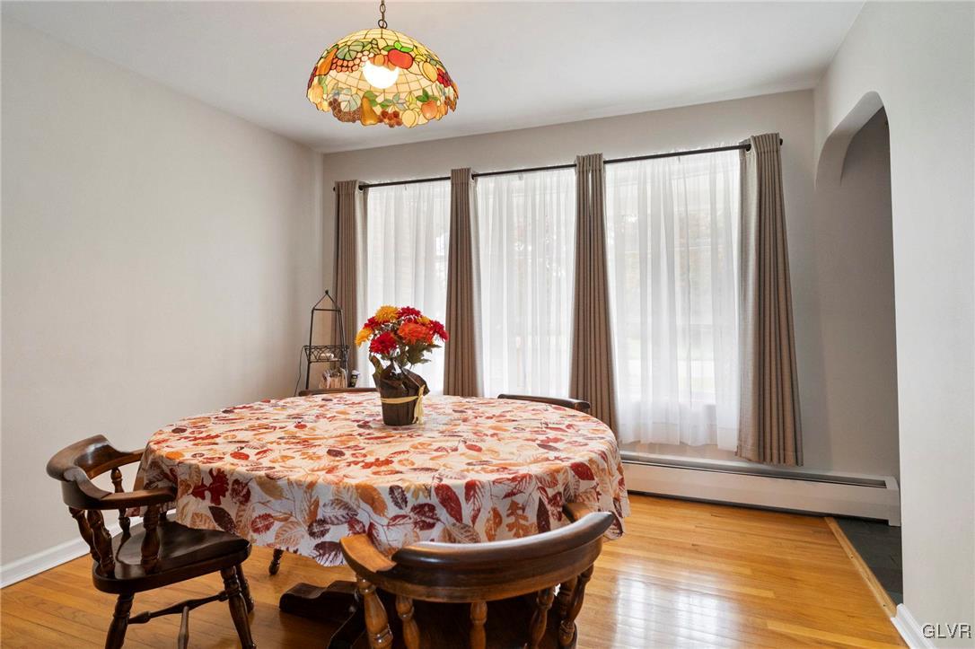 3920 Hemlock Place Bethlehem, PA 18017 - Photo 18 of 39 a bedroom with a bed and a chandelier