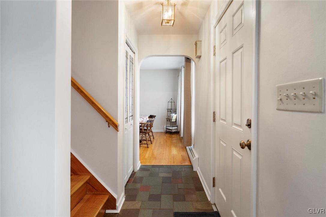 3920 Hemlock Place Bethlehem, PA 18017 - Photo 20 of 39 a view of a hallway with a hallway and a livingroom with furniture