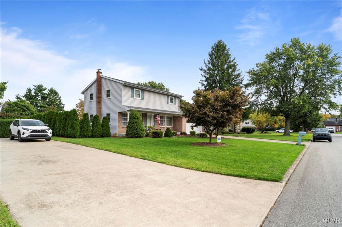 3920 Hemlock Place Bethlehem, PA 18017 - Photo 2 of 39 a view of a house with a yard