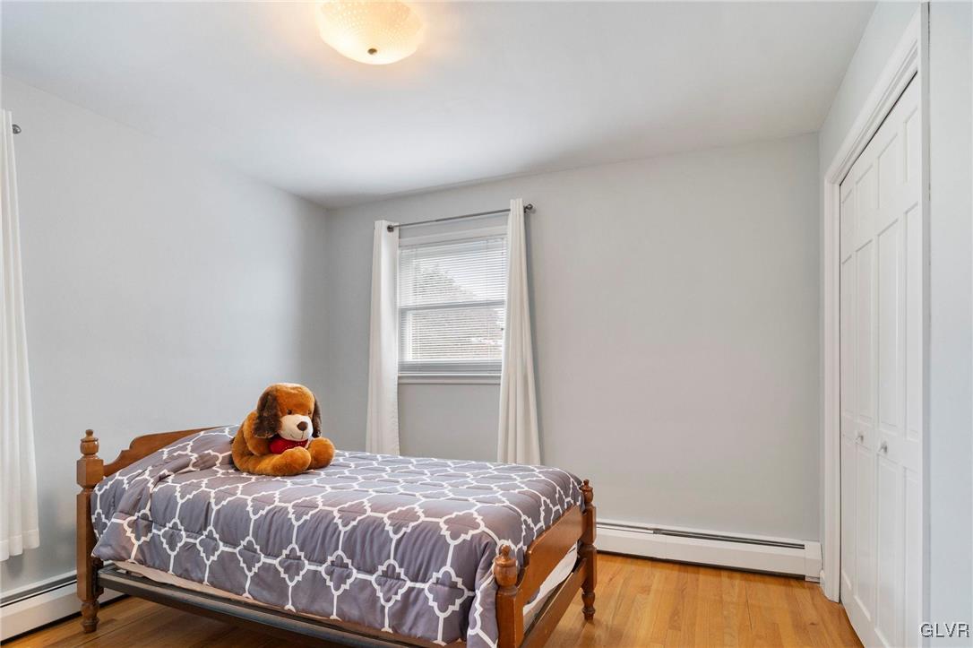 3920 Hemlock Place Bethlehem, PA 18017 - Photo 23 of 39 a bedroom with a bed and a window