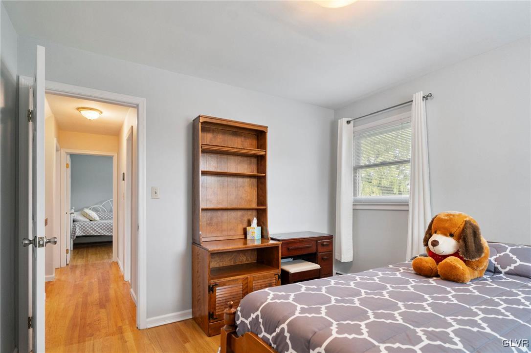 3920 Hemlock Place Bethlehem, PA 18017 - Photo 24 of 39 a bedroom with a bed and a window