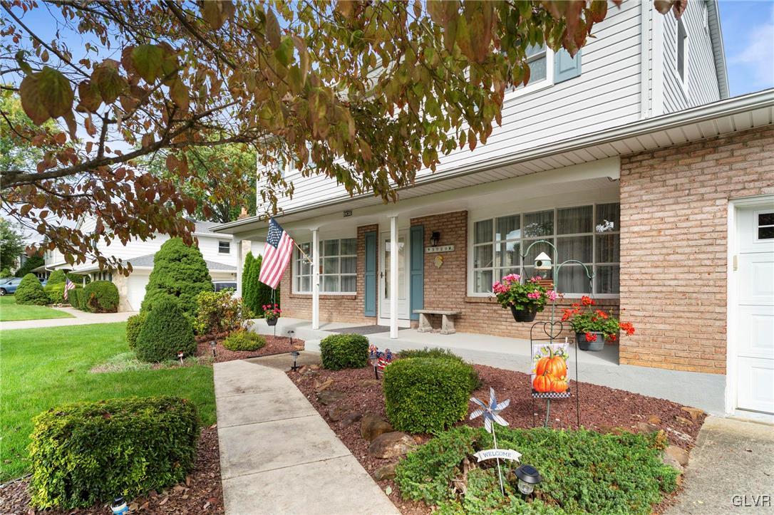 3920 Hemlock Place Bethlehem, PA 18017 - Photo 4 of 39 front view of a house with a yard