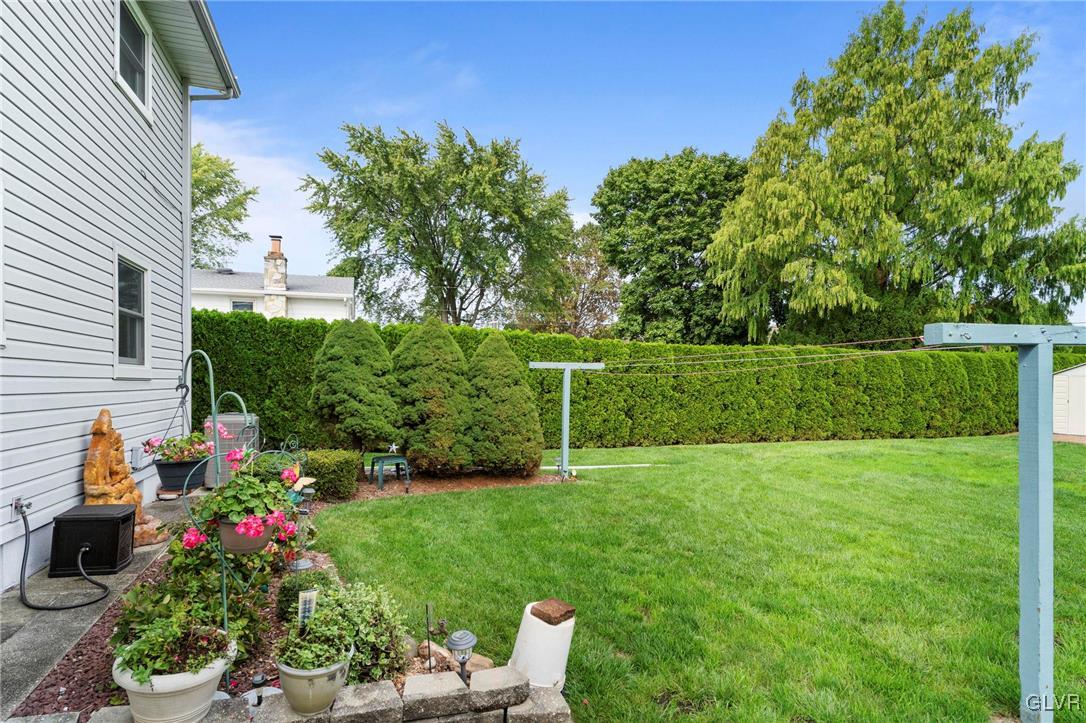 3920 Hemlock Place Bethlehem, PA 18017 - Photo 8 of 39 a view of a chair and tables in the garden