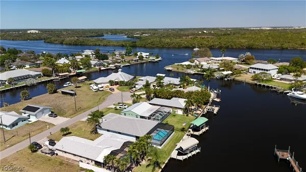an aerial view of lake and city