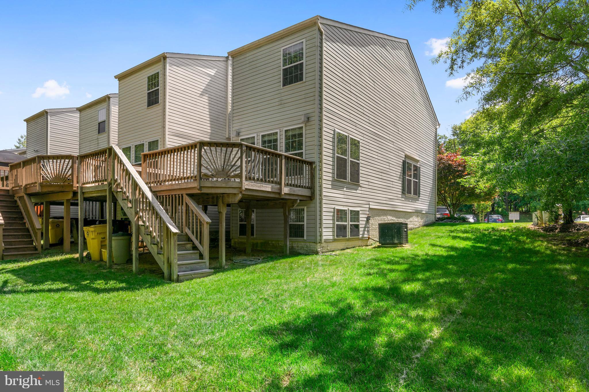2544 Summers Ridge Drive Odenton, MD 21113 - Photo 11 of 30 Large Deck facing trees with steps to lawn