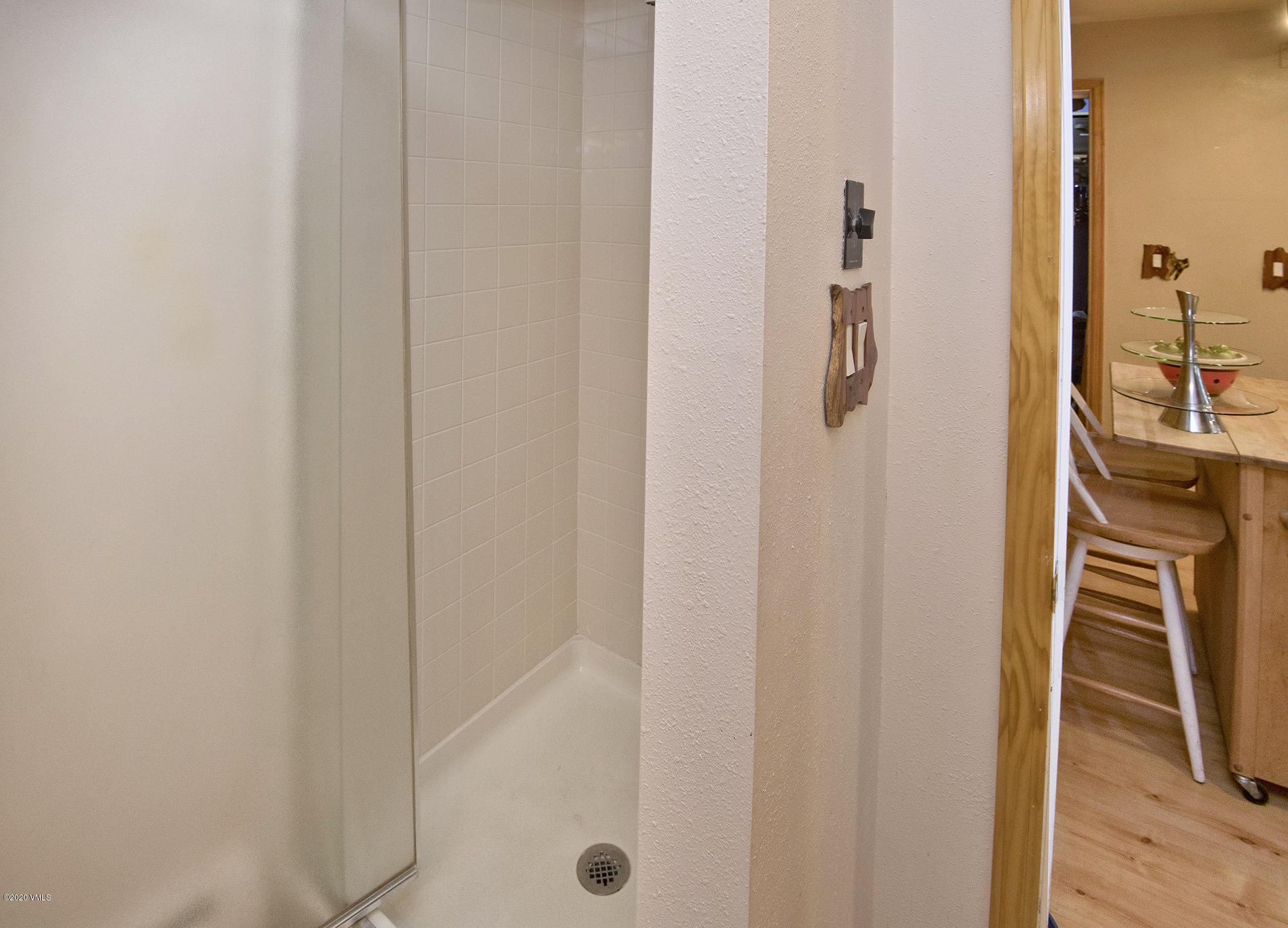 34 Beaver Road, Unit B Avon, CO 81620 - Photo 12 of 34 a bathroom with a shower and a sink