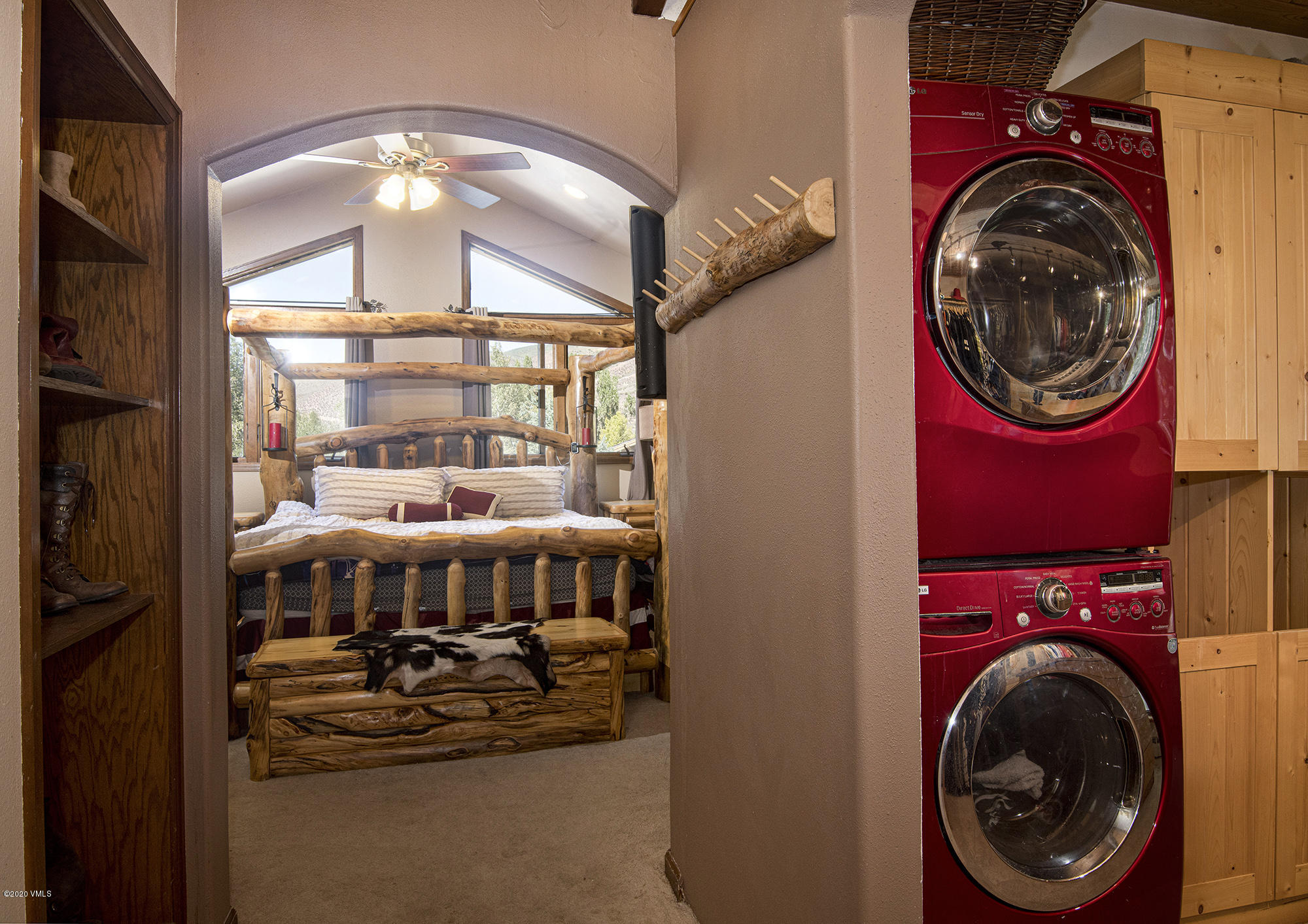 34 Beaver Road, Unit B Avon, CO 81620 - Photo 14 of 34 a bedroom with a bed and a mirror