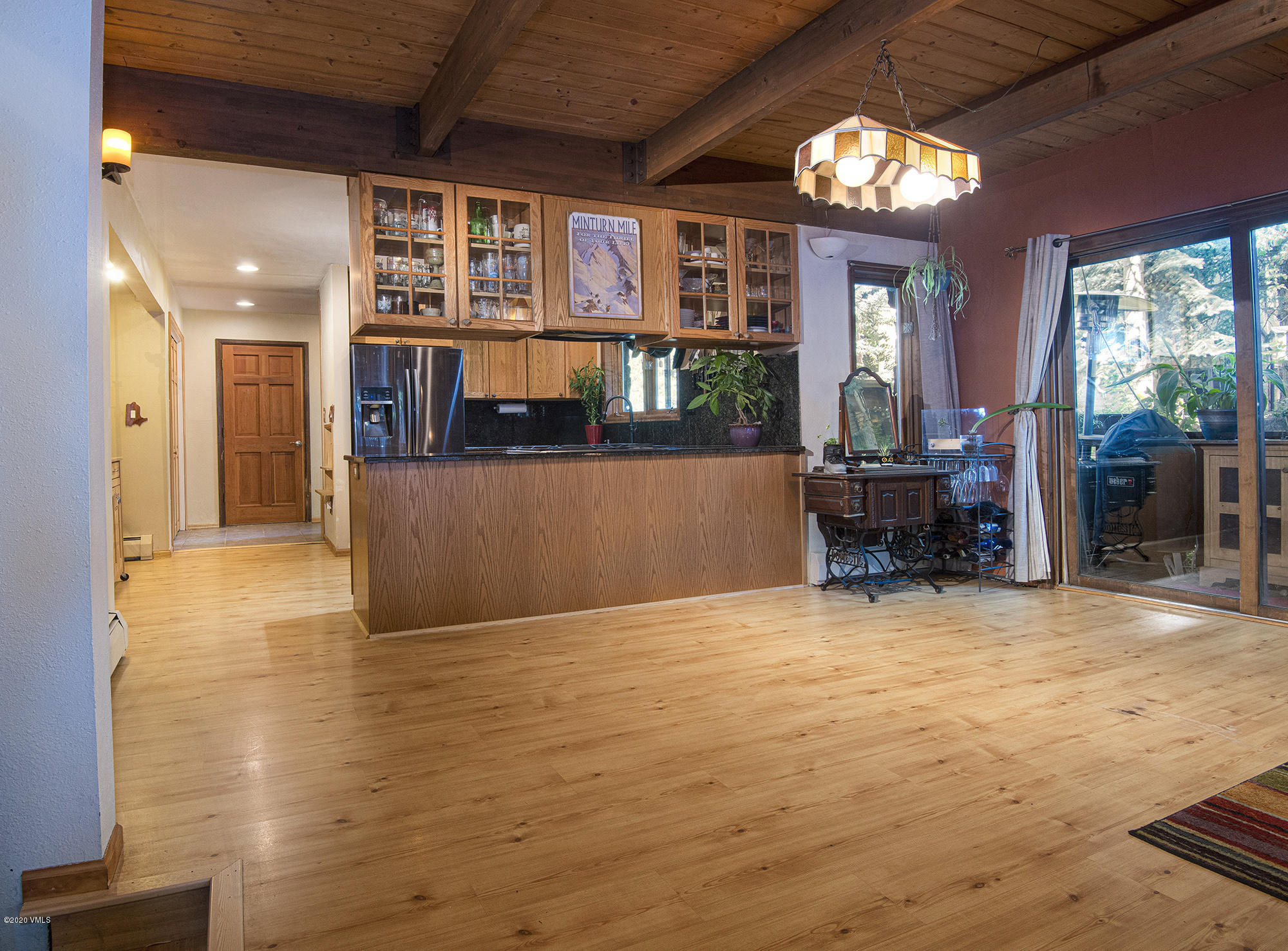34 Beaver Road, Unit B Avon, CO 81620 - Photo 6 of 34 a view of a livingroom with furniture window and wooden floor