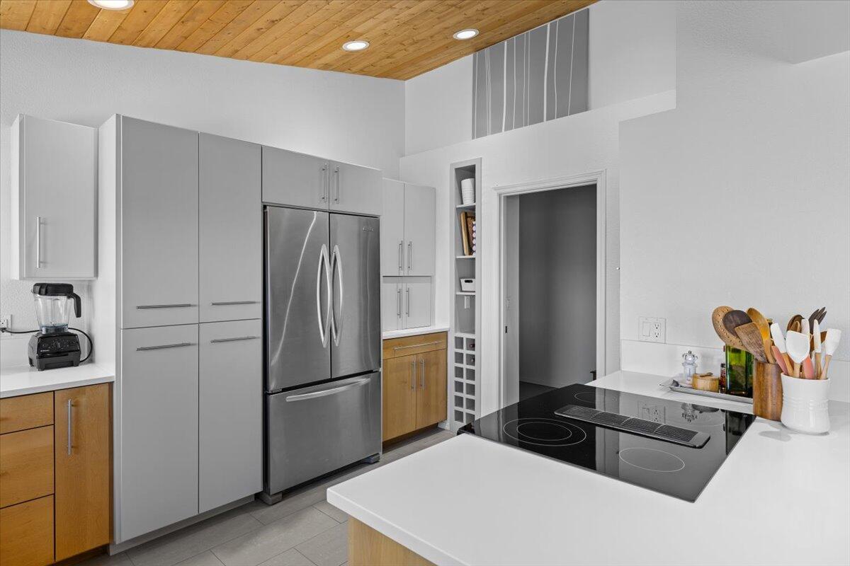 5229 Pioneer Road Medford, OR 97501 - Photo 27 of 62 Downdraft stove is a luxury touch. Hidden storage above the doorway!