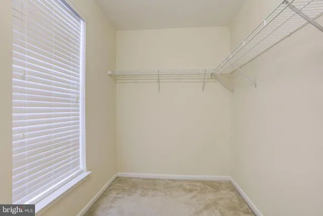 a view of a room with racks on the wall