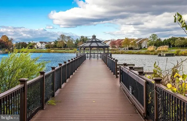 a view of a balcony with wooden floor