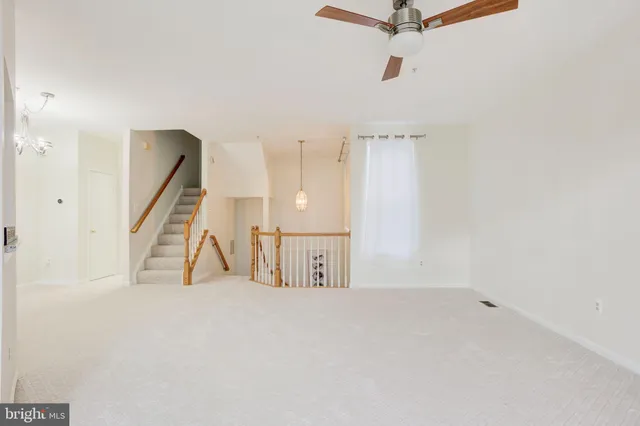 a view of a livingroom with a ceiling fan