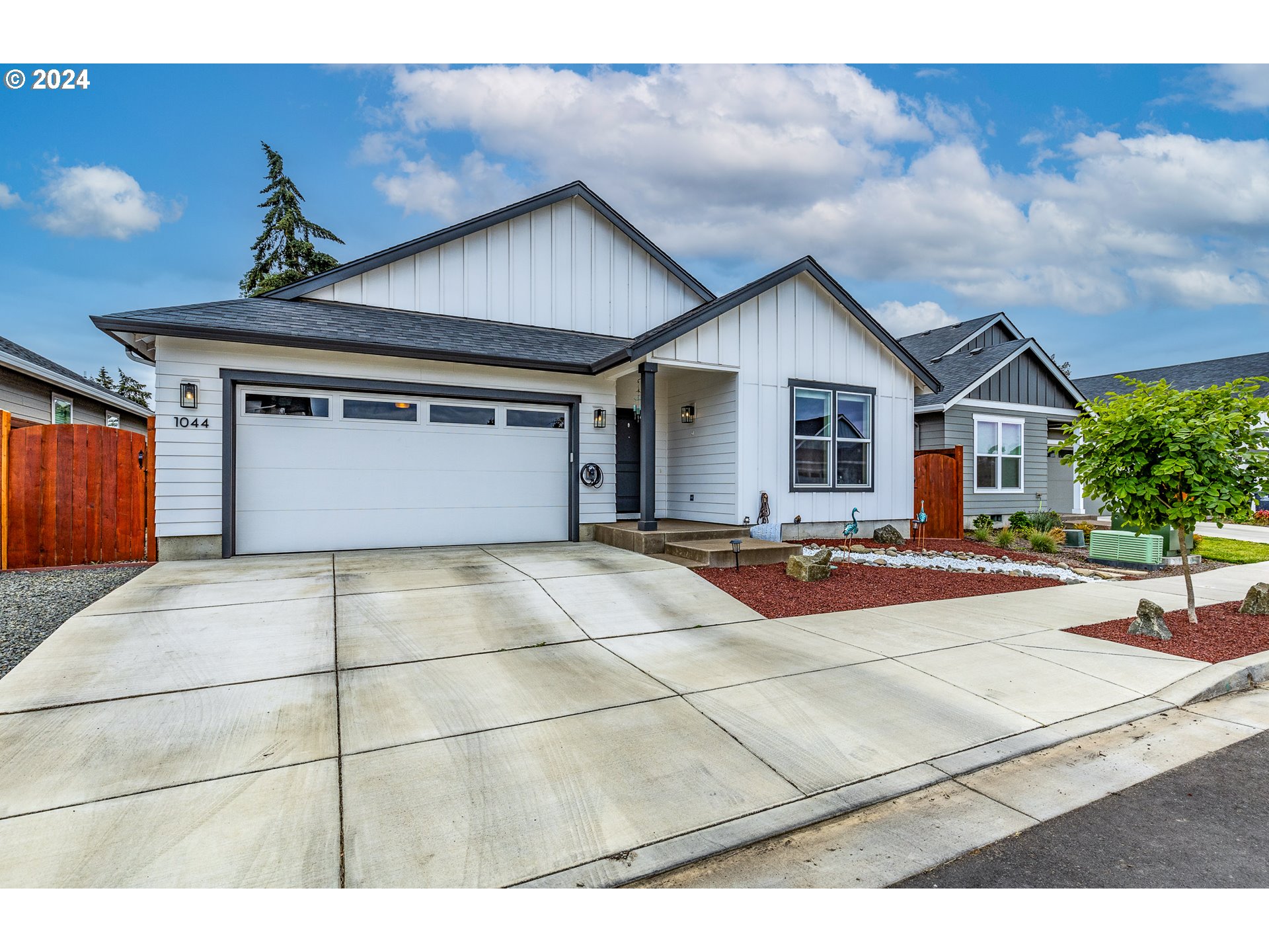 1044 West Olympic Street Springfield, OR 97477 - Photo 2 of 37 a house view with a outdoor space