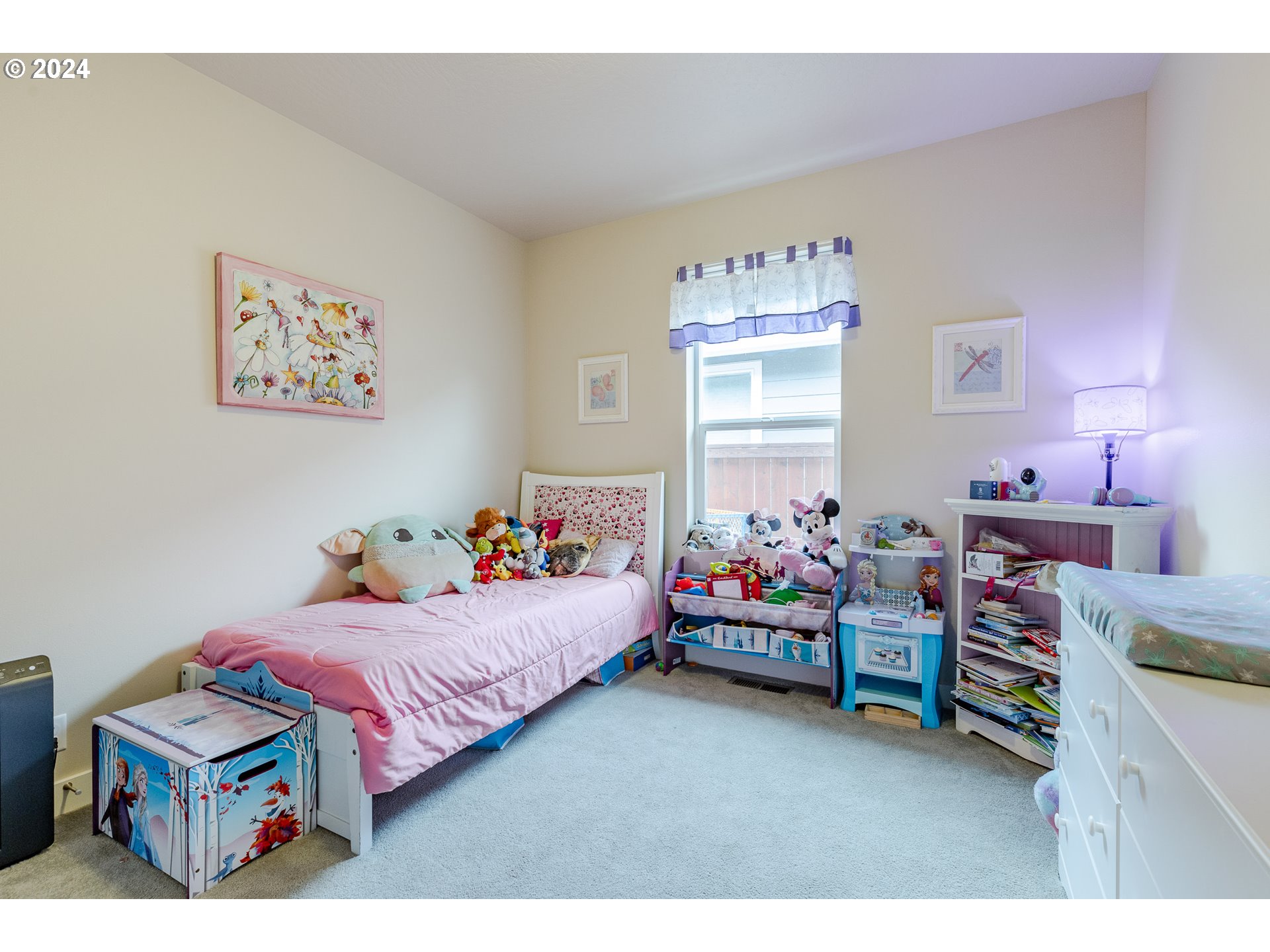 1044 West Olympic Street Springfield, OR 97477 - Photo 21 of 37 a bedroom with bed and a baby crib