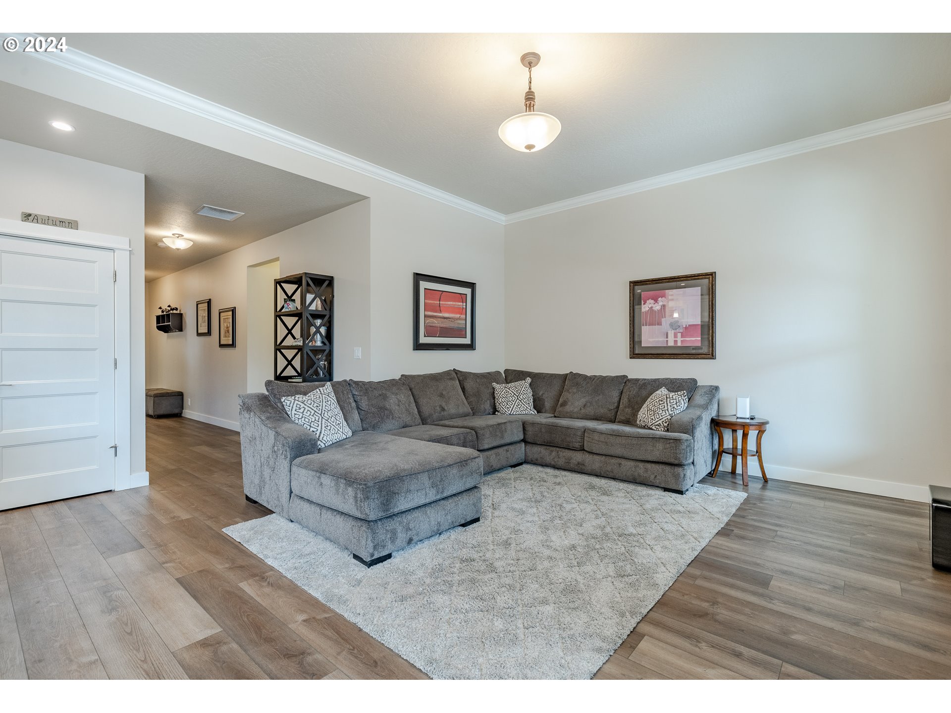 1044 West Olympic Street Springfield, OR 97477 - Photo 7 of 37 a living room with furniture and a wooden floor