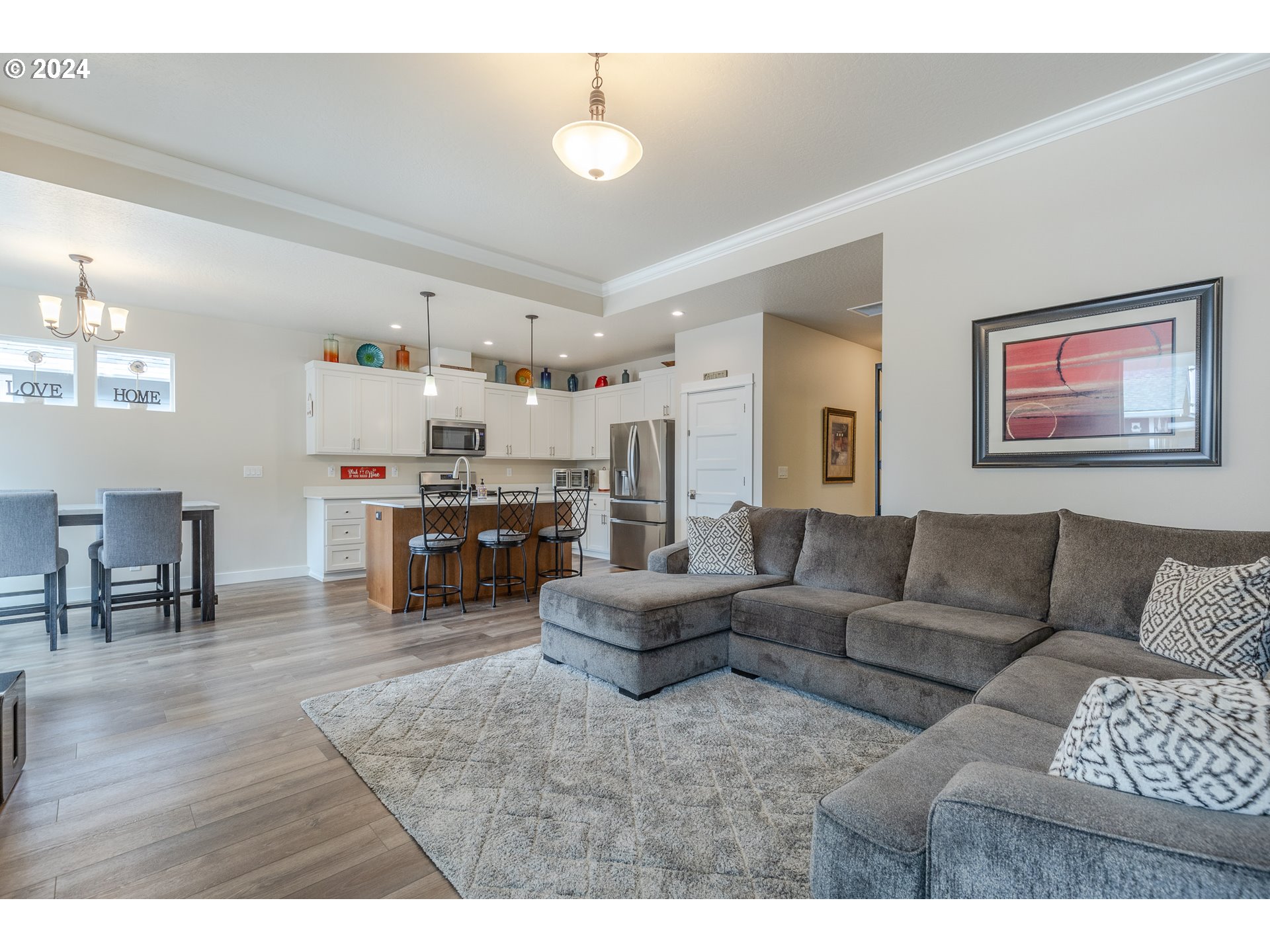 1044 West Olympic Street Springfield, OR 97477 - Photo 8 of 37 a living room with furniture and wooden floor