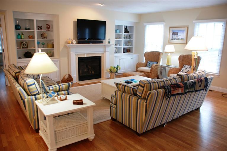 38 Bailey's Path Chatham, MA 02633 - Photo 4 of 20 a living room with furniture fireplace and a flat screen tv