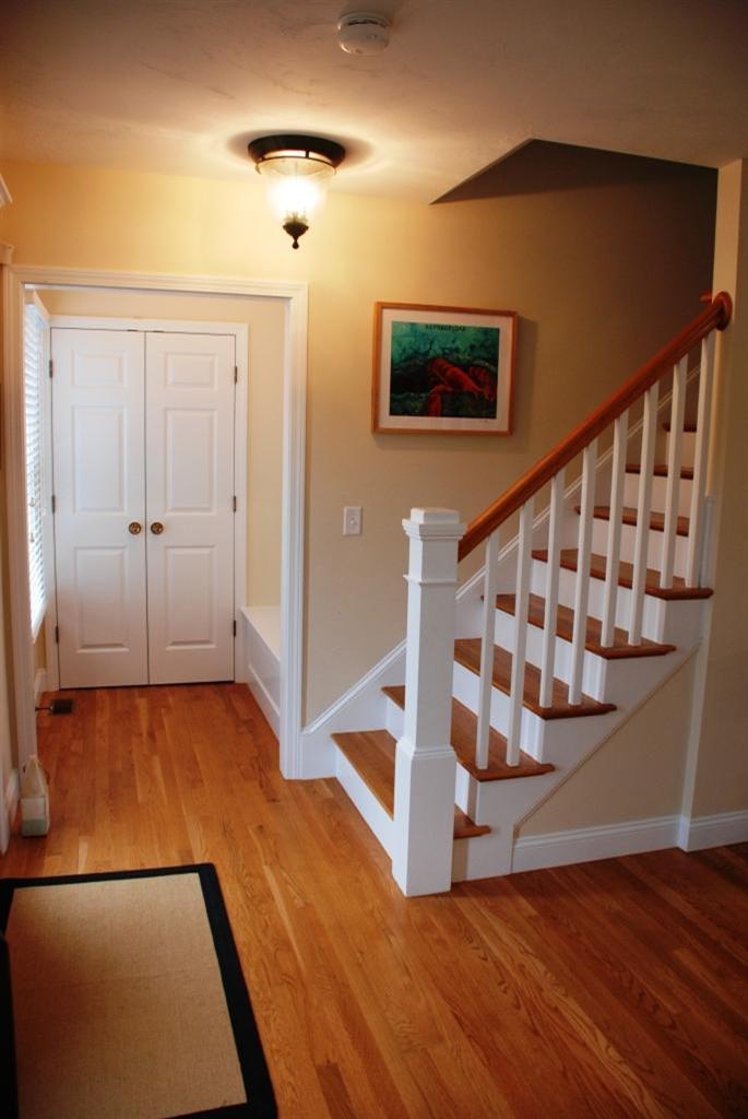 38 Bailey's Path Chatham, MA 02633 - Photo 7 of 20 a view of an empty room with wooden floor and stairs