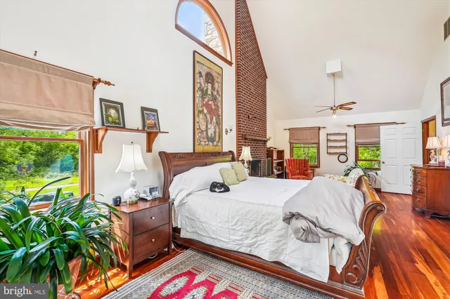 a bedroom with furniture and a window