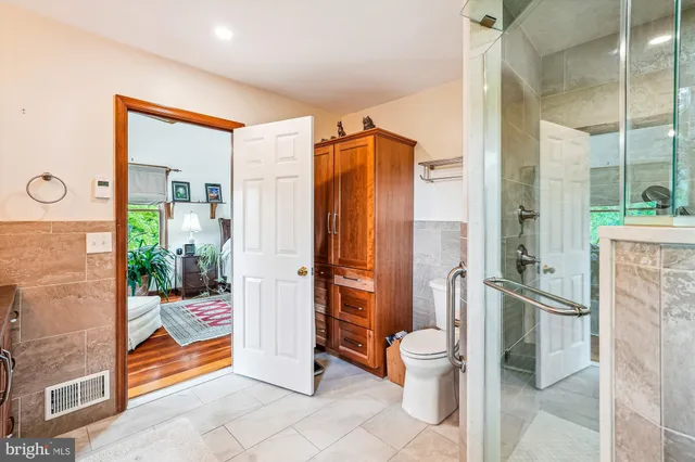 a bathroom with a sink and a window