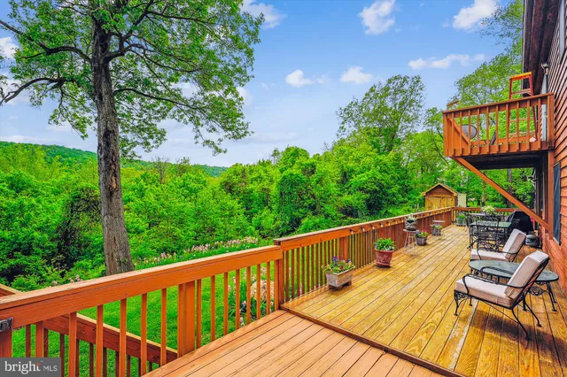 a view of a balcony with an outdoor space
