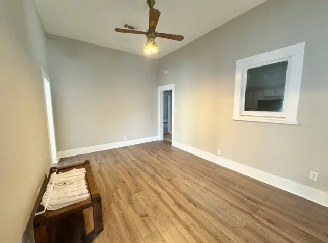 a view of livingroom with furniture and wooden floor
