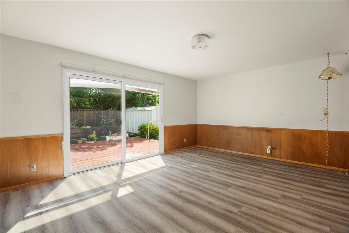 2330 Montezuma Drive Campbell, CA 95008 - Photo 4 of 19 a view of an empty room with wooden floor and a window