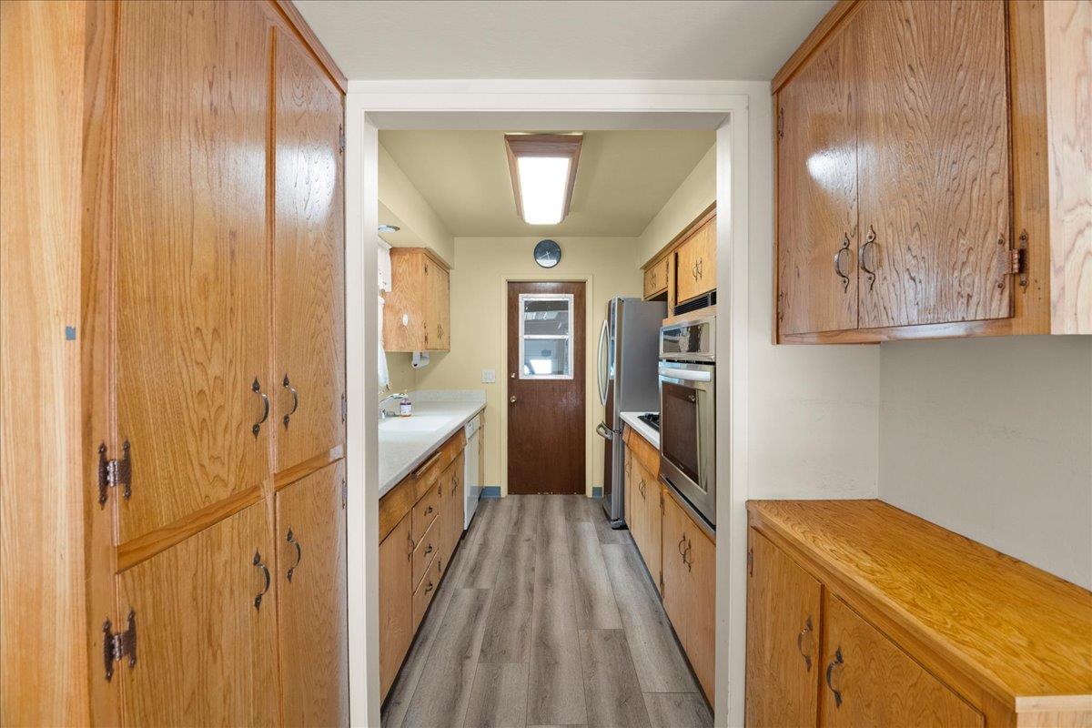 2330 Montezuma Drive Campbell, CA 95008 - Photo 5 of 19 a kitchen with stainless steel appliances granite countertop a refrigerator and a stove