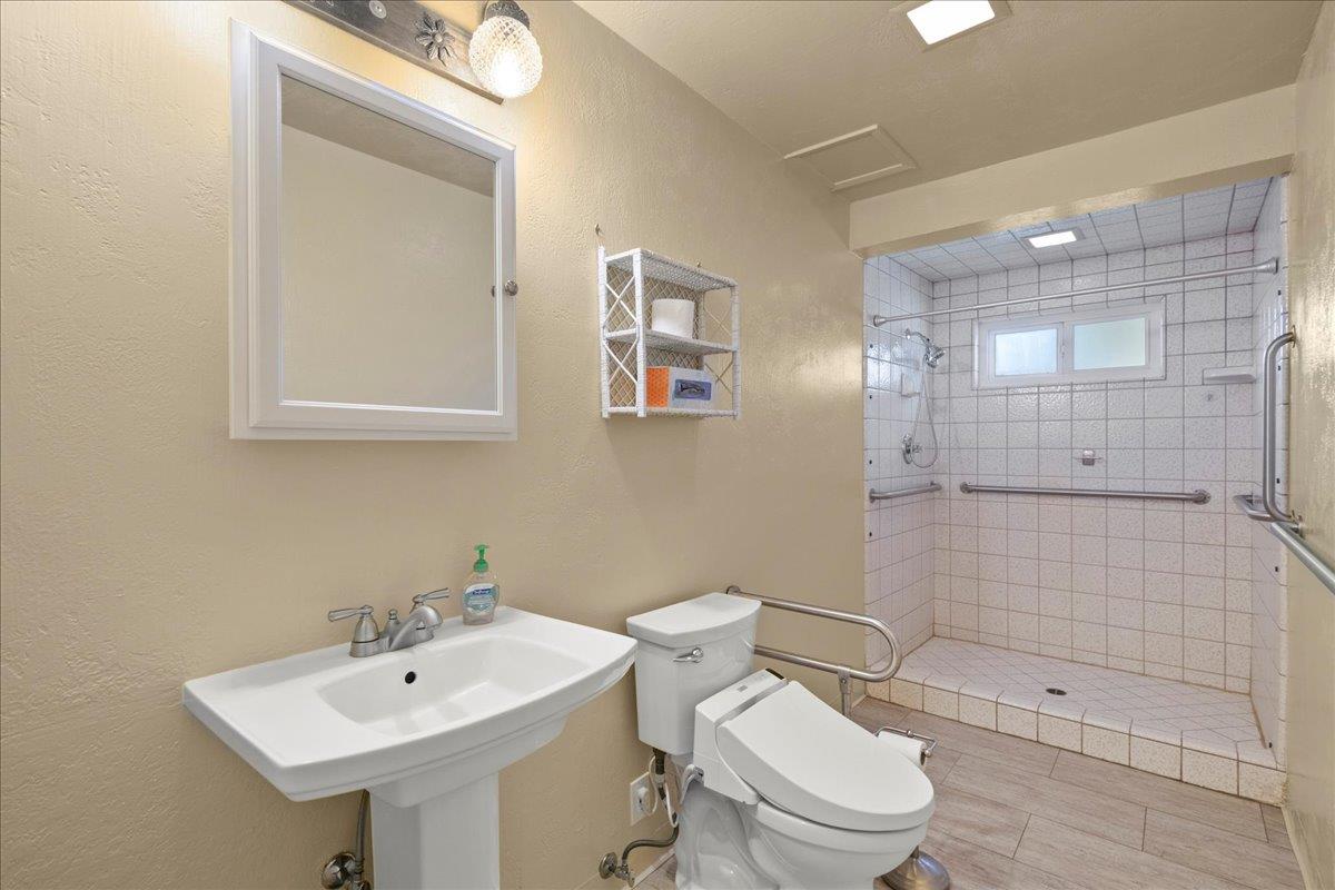 2330 Montezuma Drive Campbell, CA 95008 - Photo 8 of 19 a bathroom with a sink toilet and shower