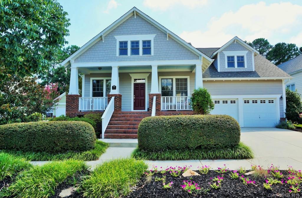 149 Mills Lane Fort Mill, SC 29708 - Photo 1 of 24 a front view of a house with a yard