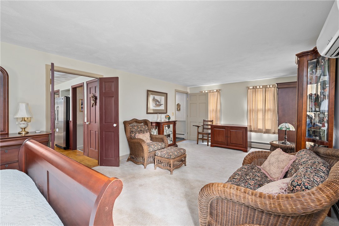 4 Old Forge Road Cumberland, RI 02864 - Photo 17 of 43 Living room off the kitchen and main foyer