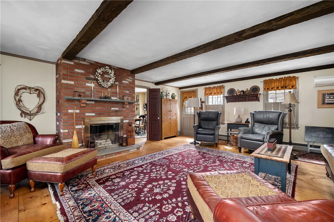 4 Old Forge Road Cumberland, RI 02864 - Photo 3 of 43 Family room with brick fireplace
