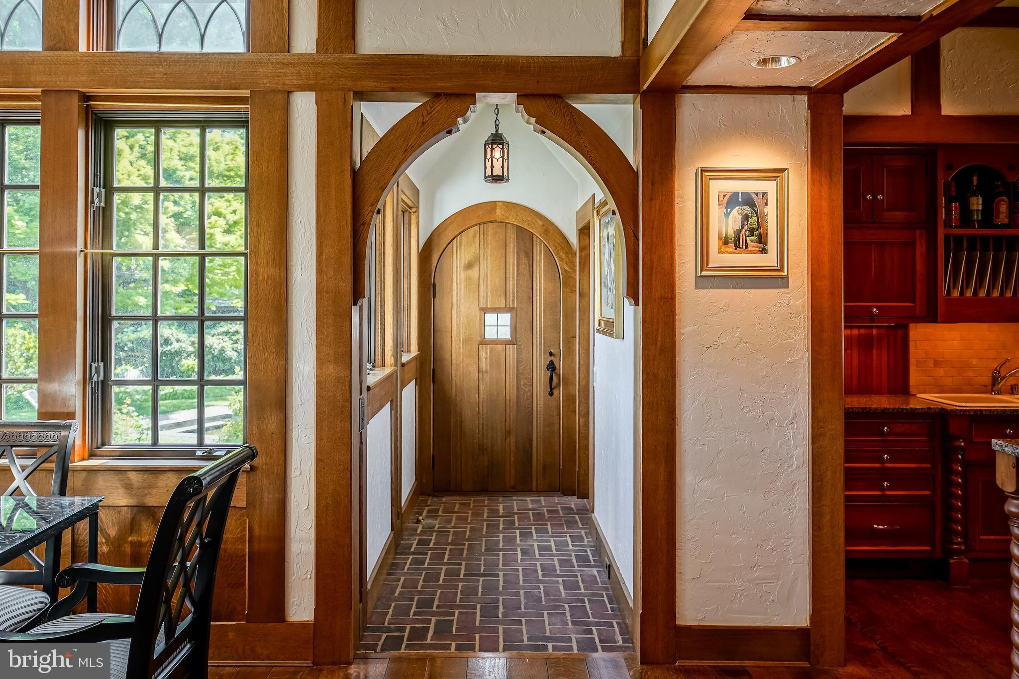 869 Childs Point Road Annapolis, MD 21401 - Photo 19 of 51 Gorgeous brick floors to the pantry and 1/2 bath