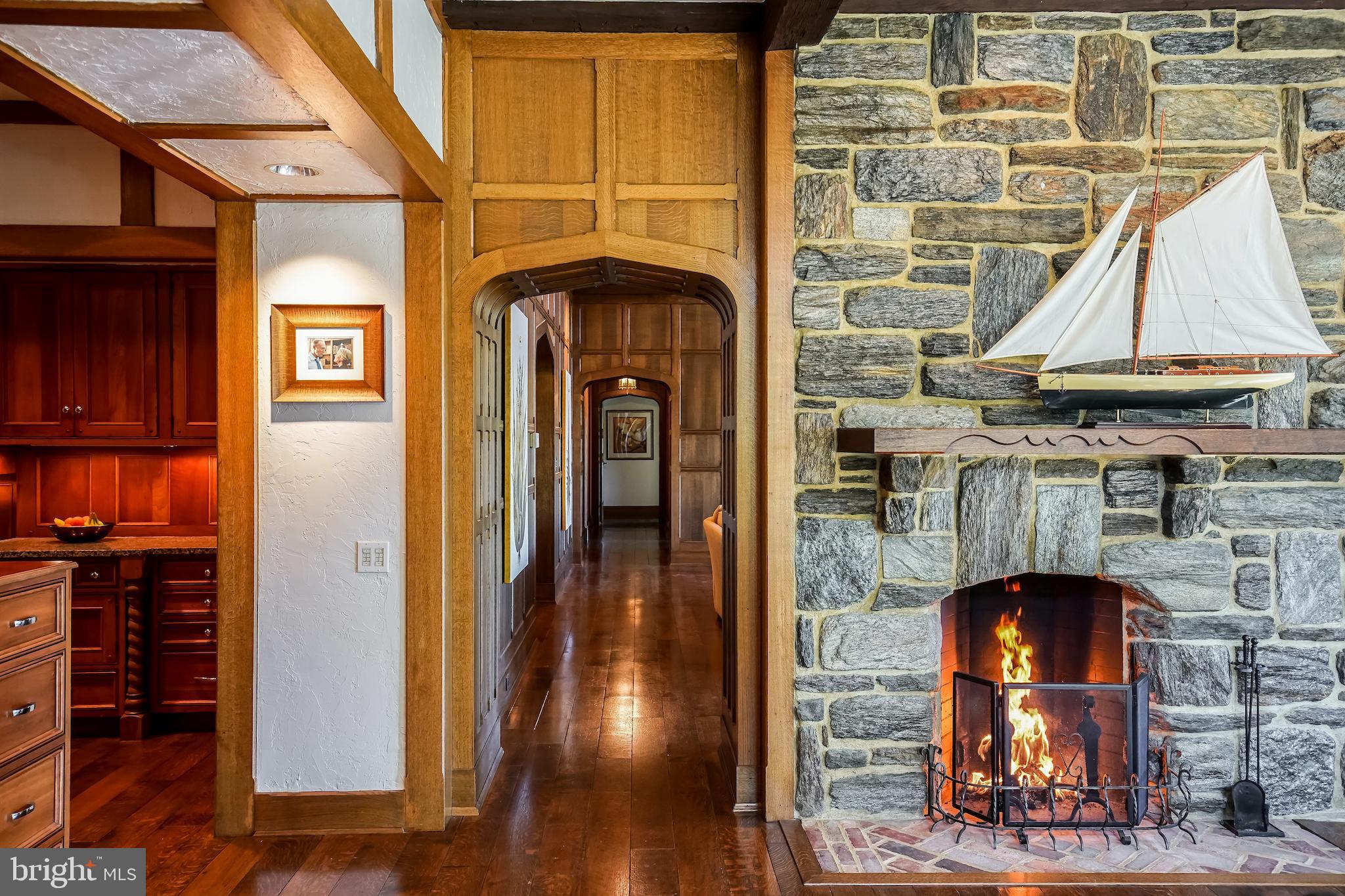869 Childs Point Road Annapolis, MD 21401 - Photo 20 of 51 Details in plaster walls and cozy fireplace