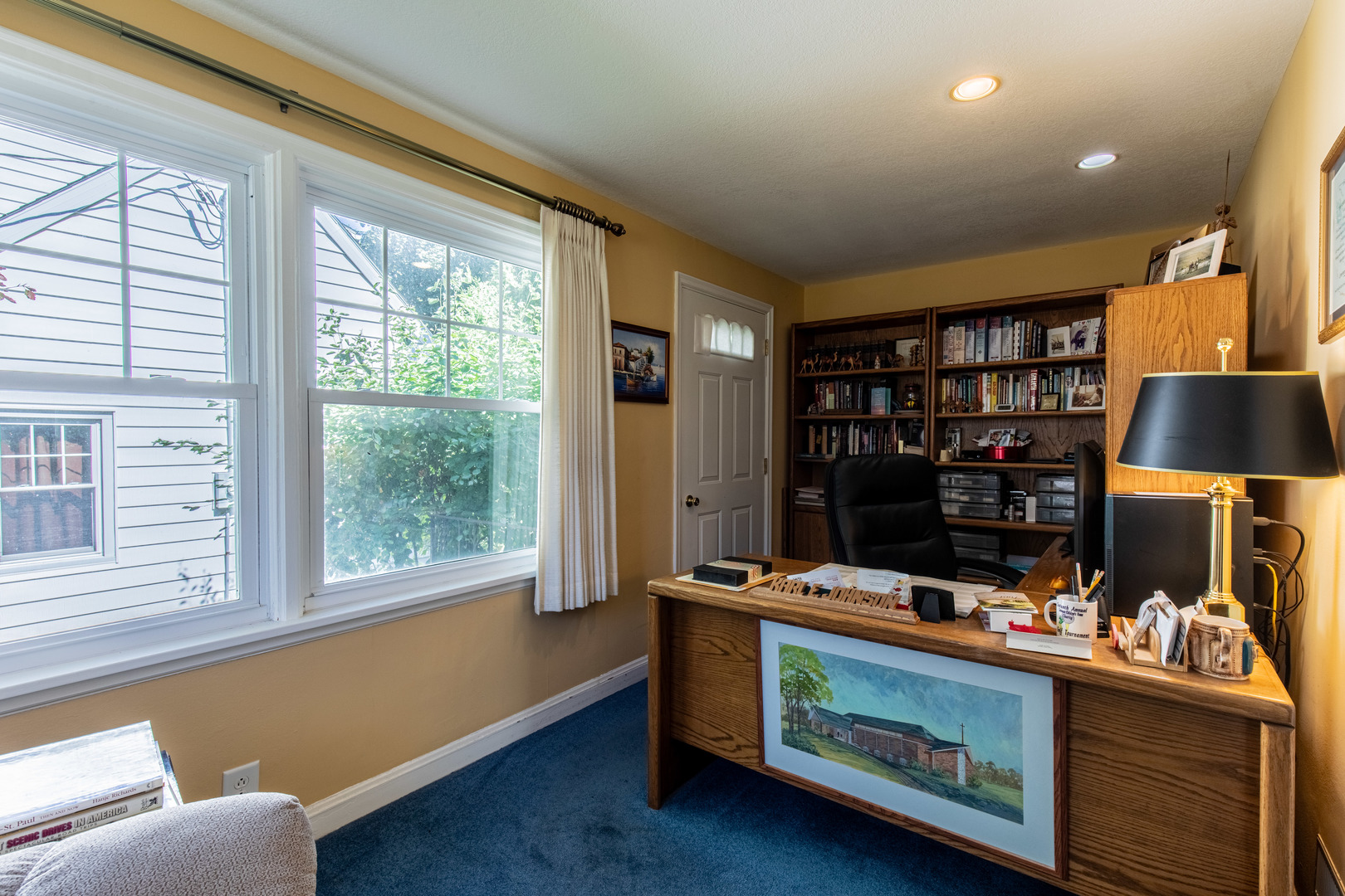 428 East Thompson Street Princeton, IL 61356 - Photo 13 of 32 a room with furniture and a window
