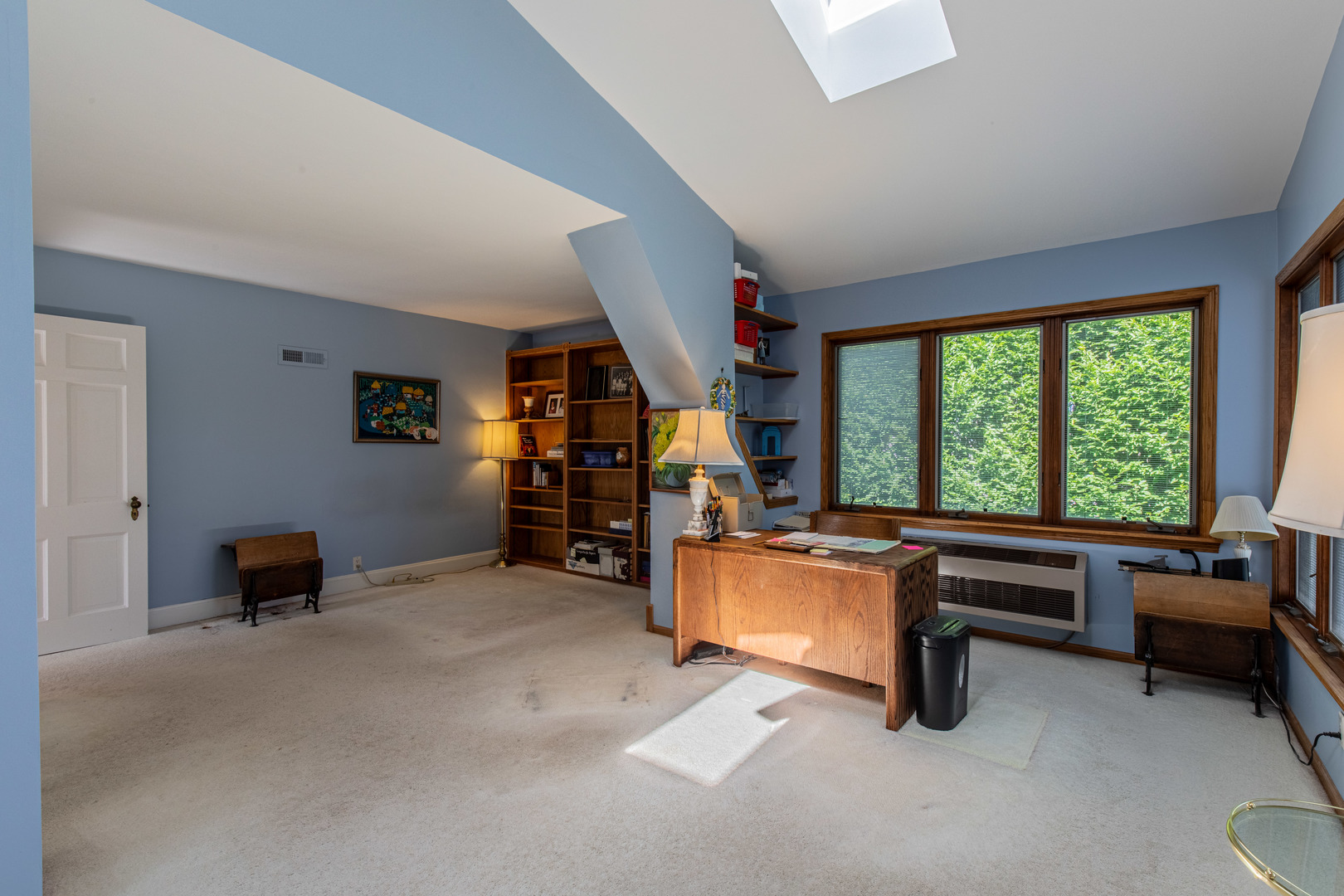 428 East Thompson Street Princeton, IL 61356 - Photo 25 of 32 a view of a big room with furniture and a window