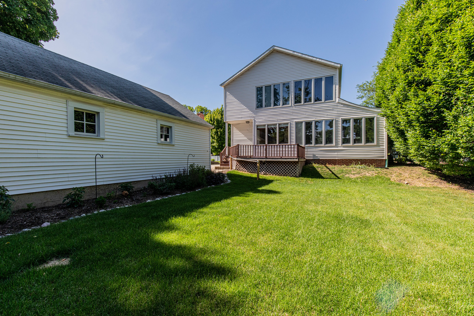 428 East Thompson Street Princeton, IL 61356 - Photo 6 of 32 a front view of a house with yard and green space
