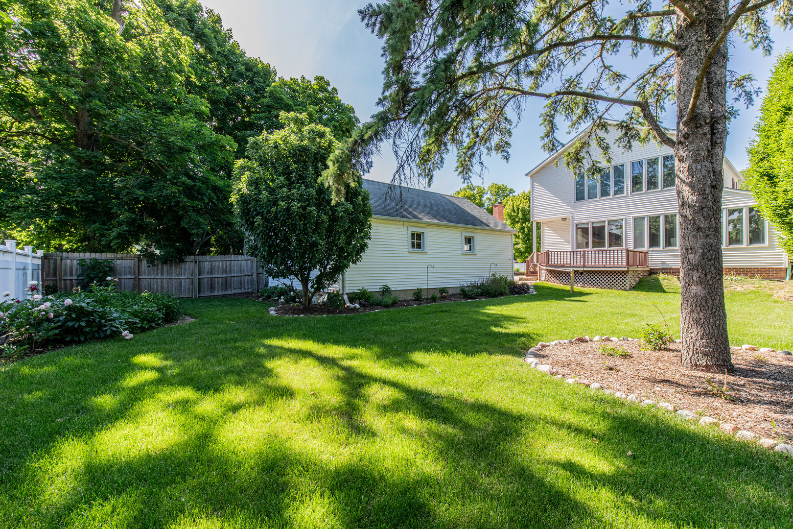 428 East Thompson Street Princeton, IL 61356 - Photo 7 of 32 a view of backyard with garden and trees