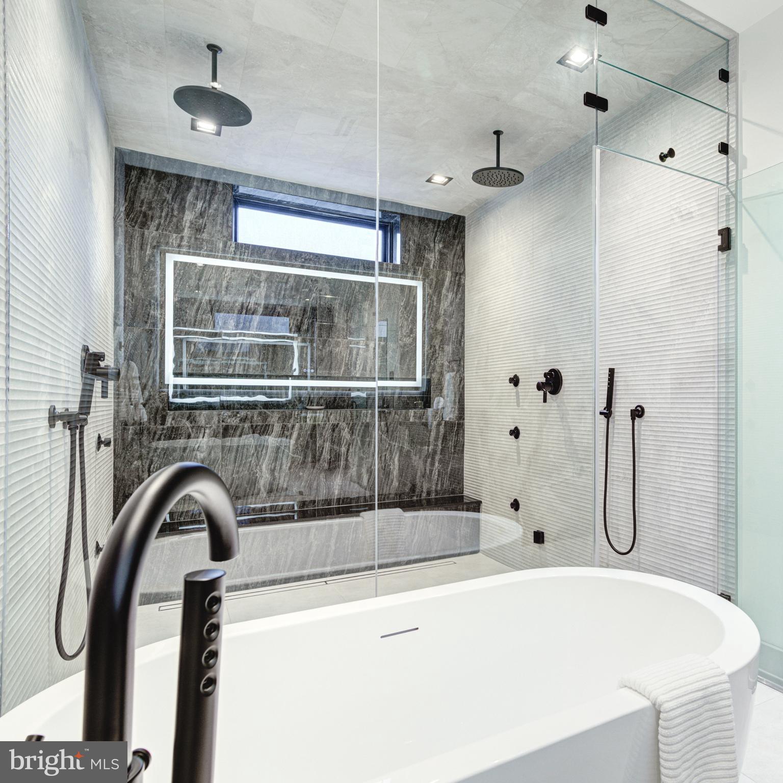 111 South 24th Street Philadelphia, PA 19103 - Photo 24 of 57 a bathroom with a bathtub and shower