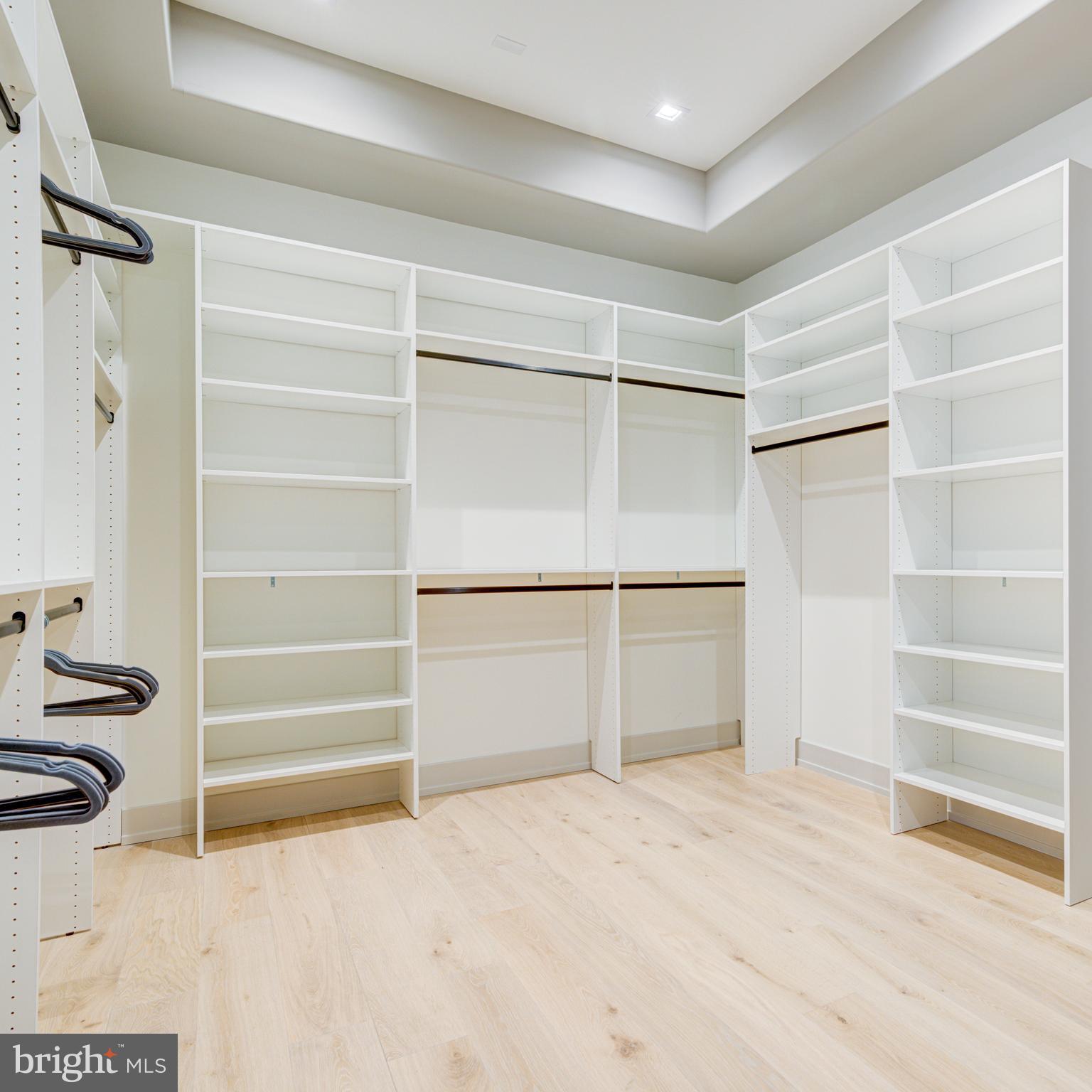111 South 24th Street Philadelphia, PA 19103 - Photo 29 of 57 a room with walk in closet and empty racks