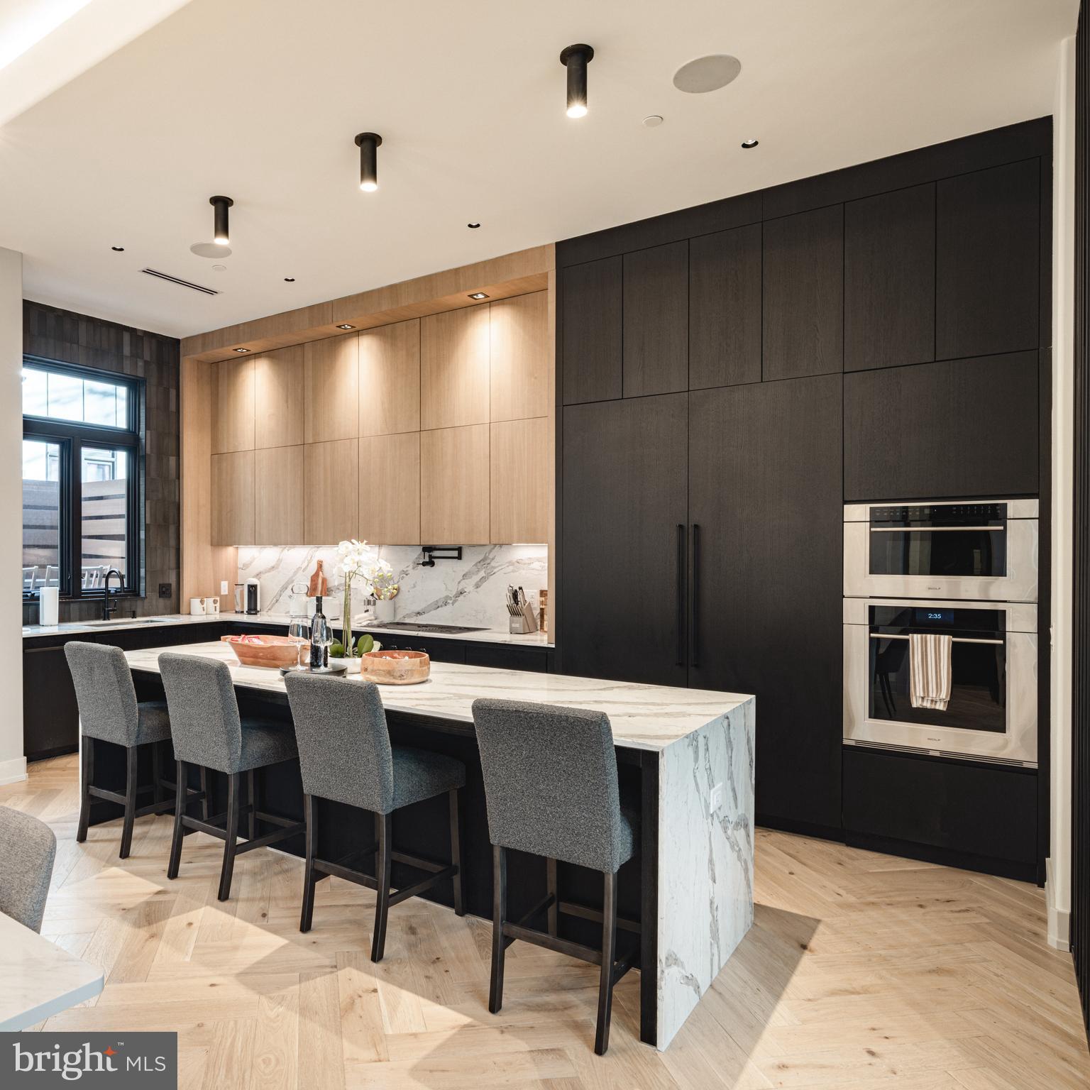 111 South 24th Street Philadelphia, PA 19103 - Photo 3 of 57 a view of a dining room with furniture