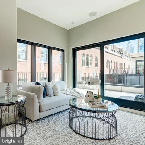 a large bathroom with a sink and mirror