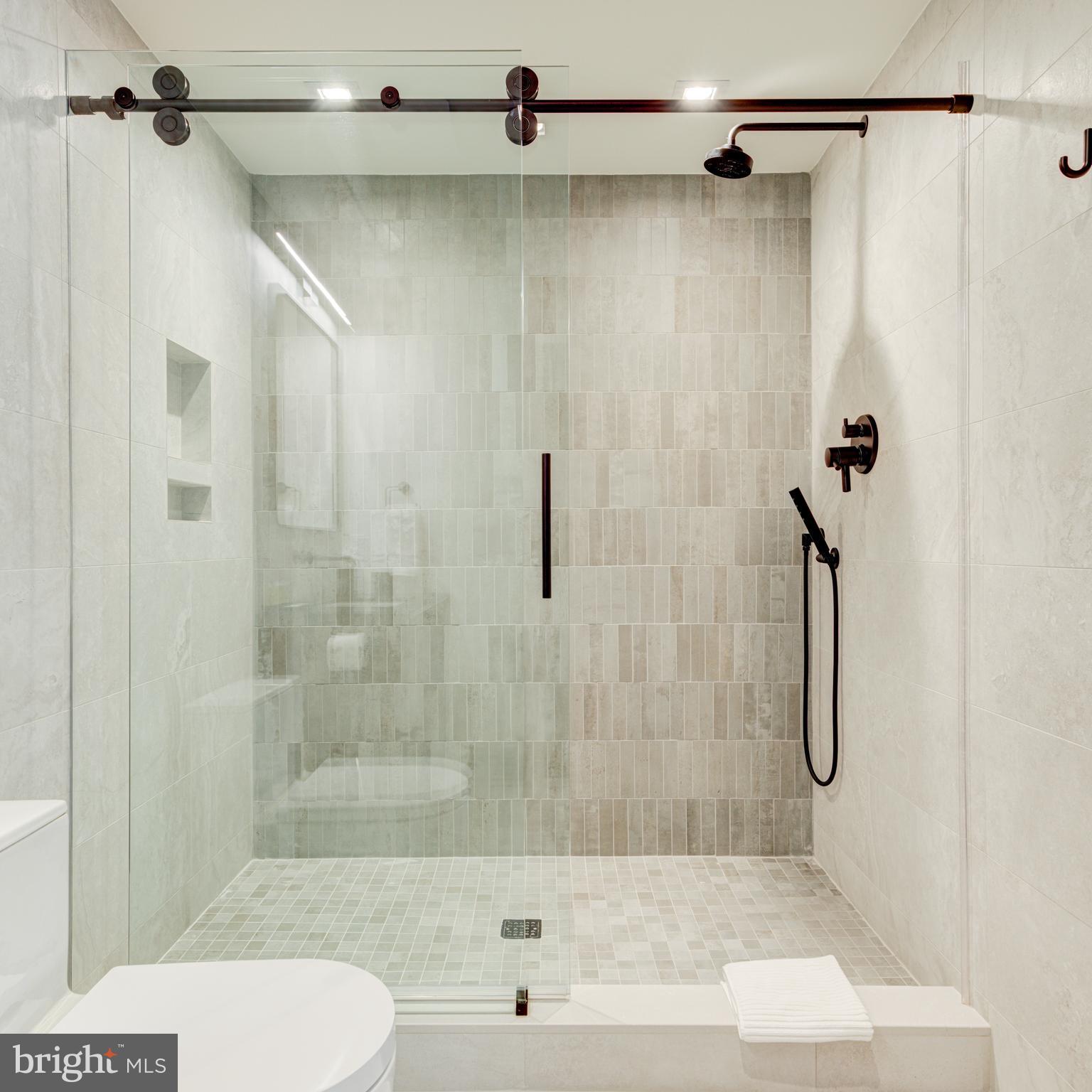 111 South 24th Street Philadelphia, PA 19103 - Photo 44 of 57 a bathroom with a shower and a toilet