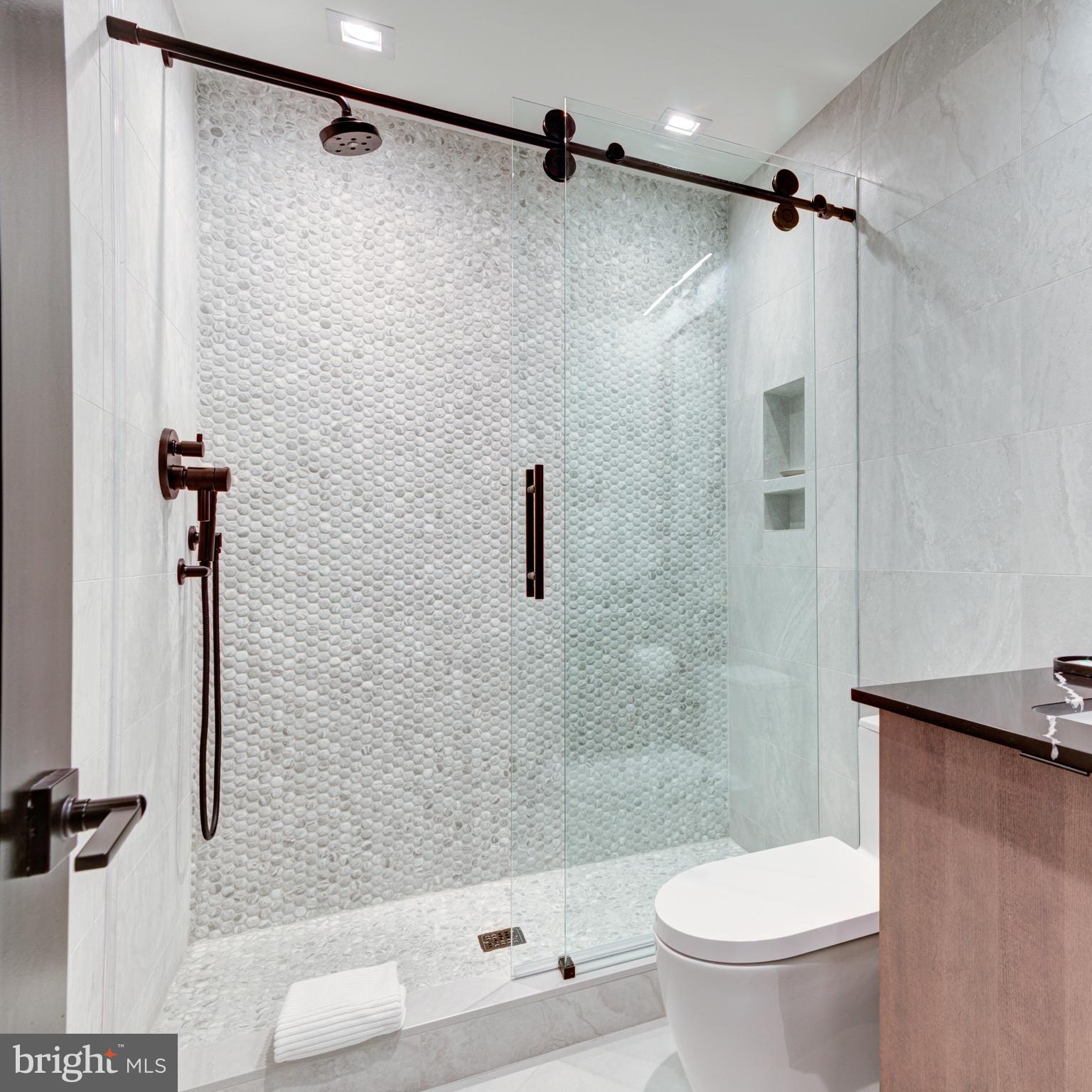 111 South 24th Street Philadelphia, PA 19103 - Photo 54 of 57 a bathroom with a shower and a toilet